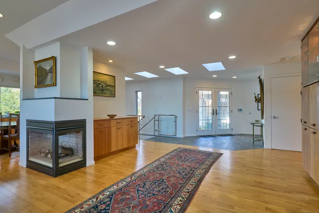 a workspace with furniture and a window