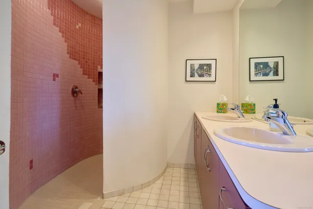 a living room with fireplace furniture and a flat screen tv