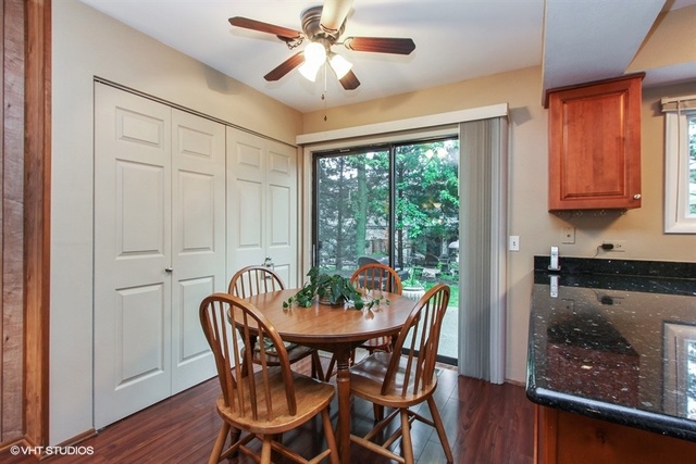 108 Ginger Court Rolling Meadows, IL 60008 - Photo 5 of 15 a view of a dining room with furniture window and outside view