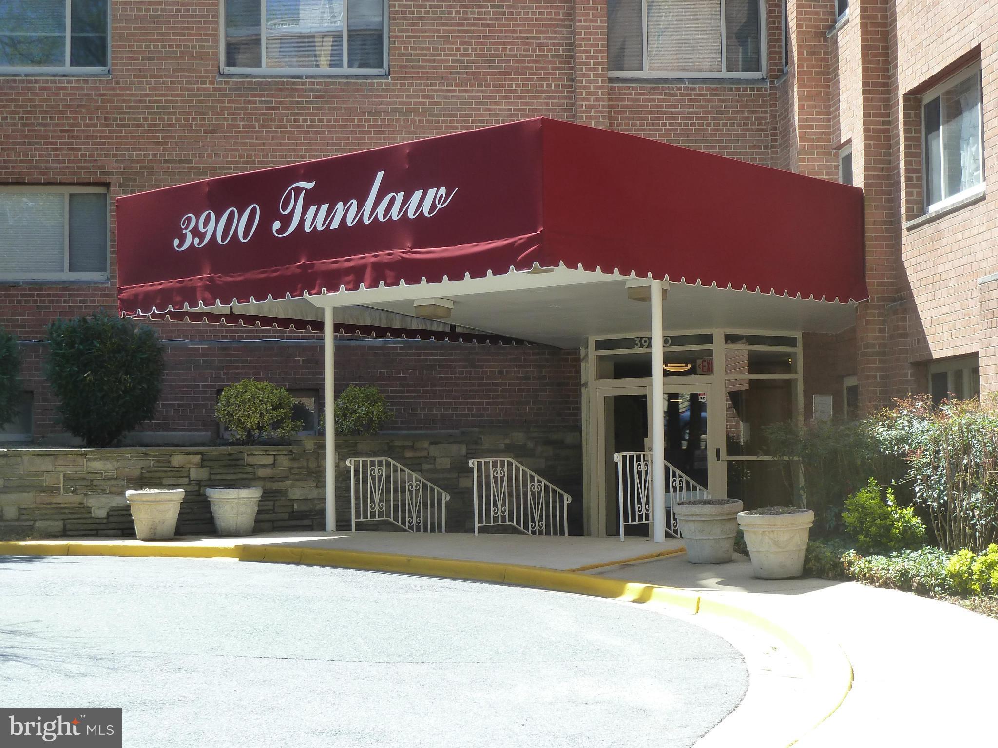 3900 Tunlaw Road Northwest, Unit 610 Washington, DC 20007 - Photo 22 of 22 a view of a building with sign board