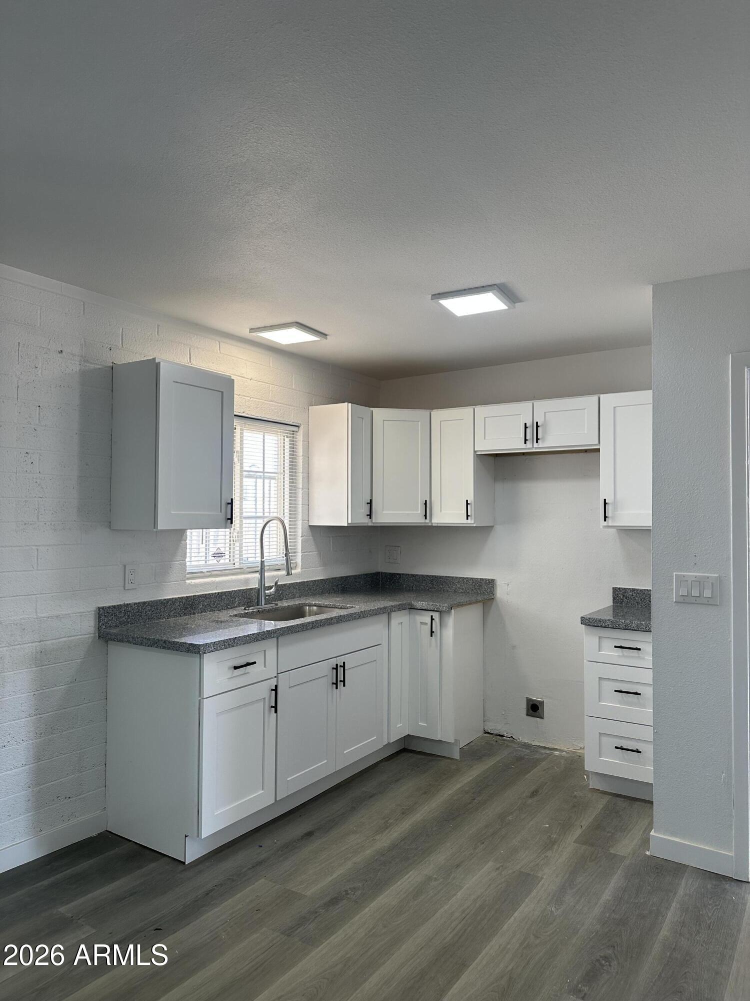 1542 West Carson Road Phoenix, AZ 85041 - Photo 7 of 22 IMG_5700