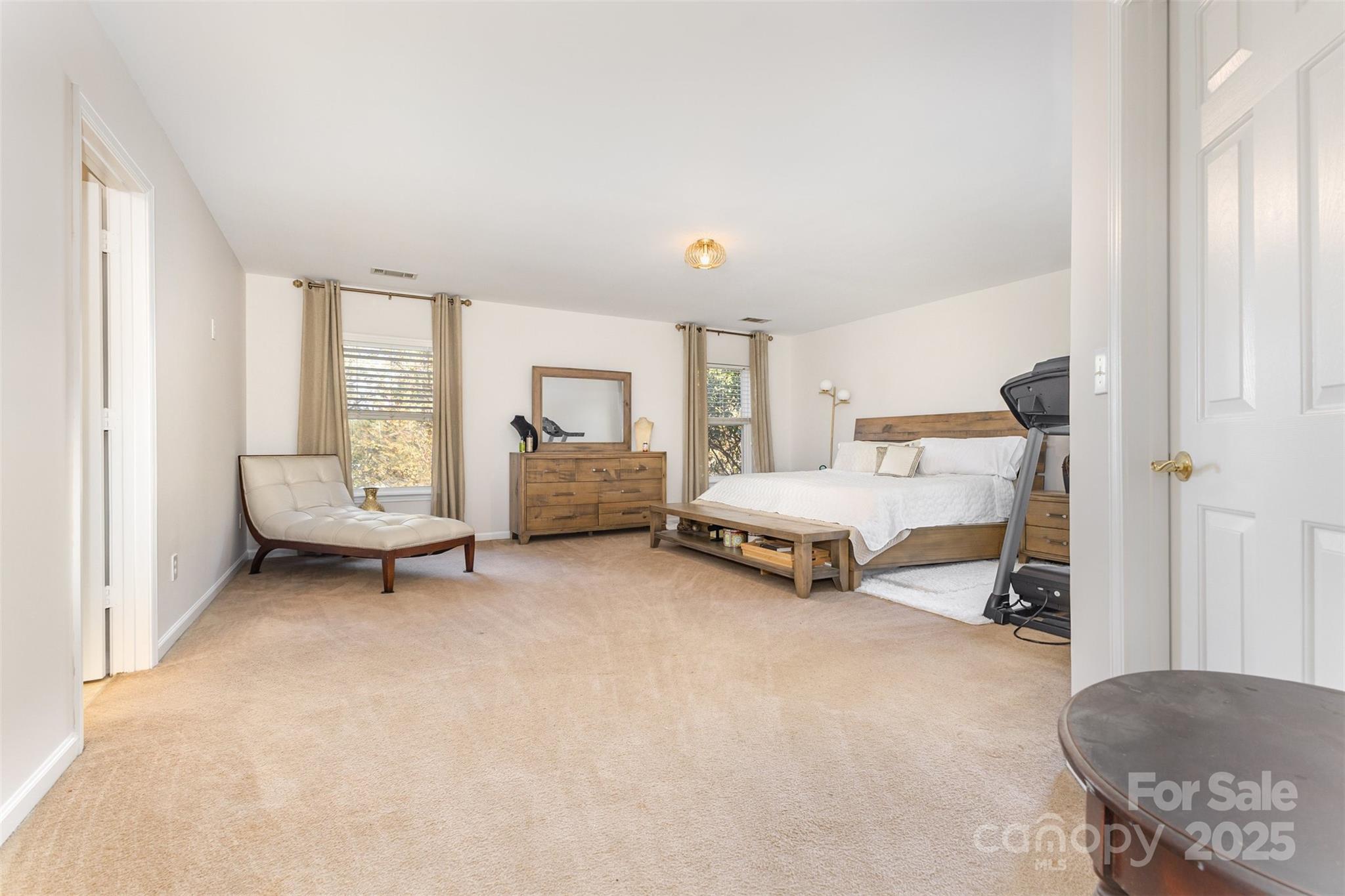 6706 Evanton Loch Road Charlotte, NC 28278 - Photo 19 of 32 a room with a bed and a chair