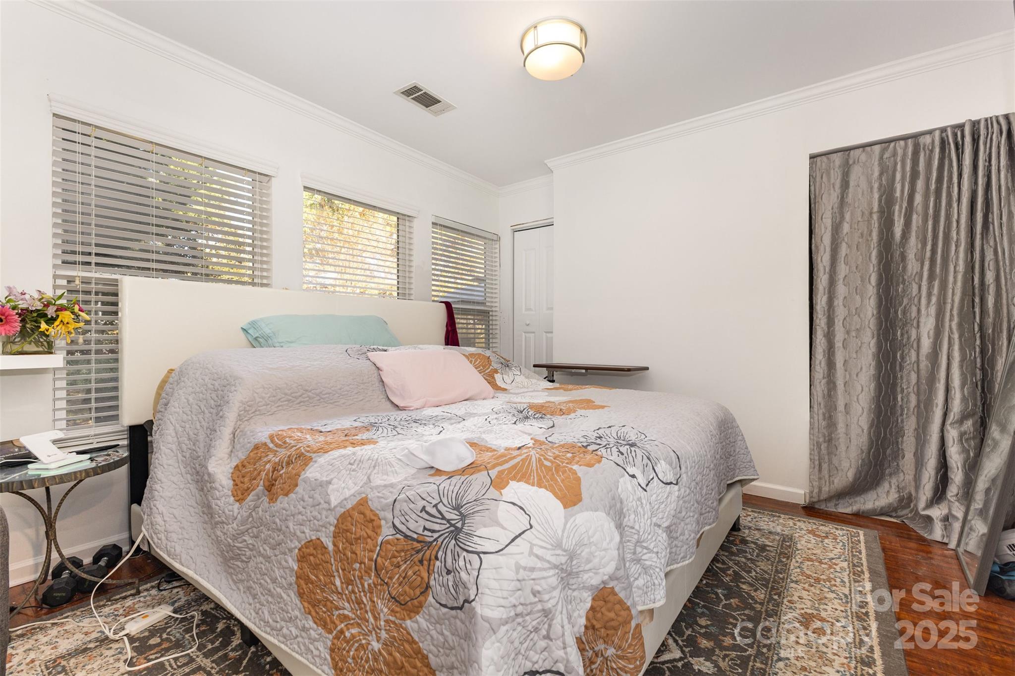 6706 Evanton Loch Road Charlotte, NC 28278 - Photo 28 of 32 a bedroom with a bed and a window