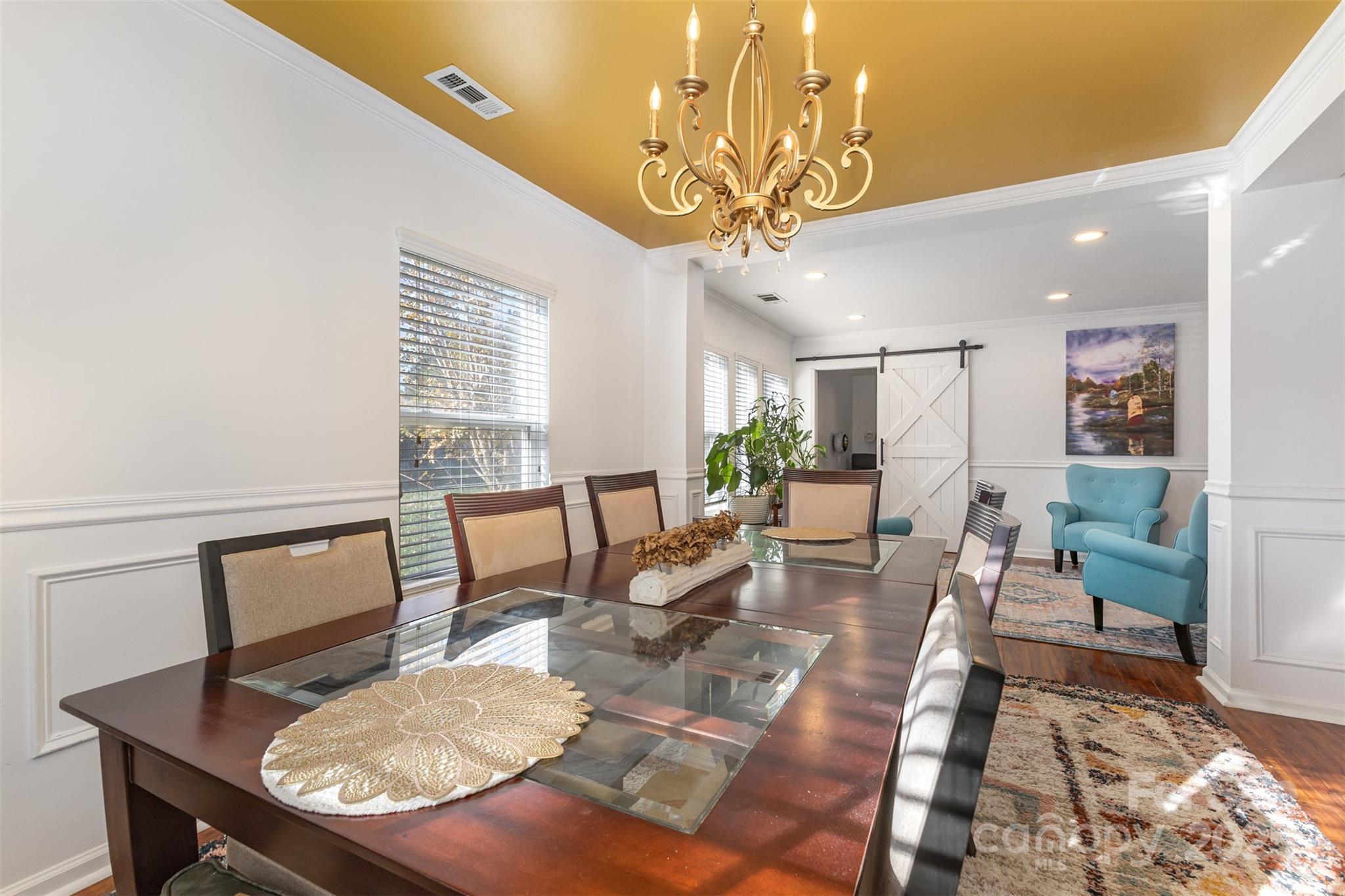 6706 Evanton Loch Road Charlotte, NC 28278 - Photo 6 of 32 a view of a dining room with furniture