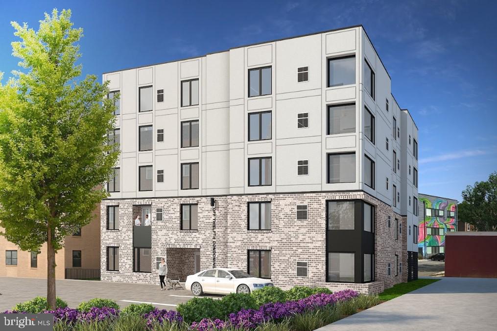 919 12th Street Northeast, Unit 301 Washington, DC 20002 - Photo 1 of 7 a large building with a lot of windows