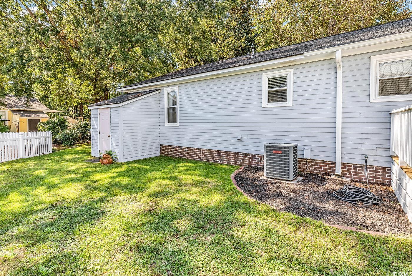 806 Keel Court Murrells Inlet, SC 29576 - Photo 23 of 35 View of property exterior featuring cooling unit a