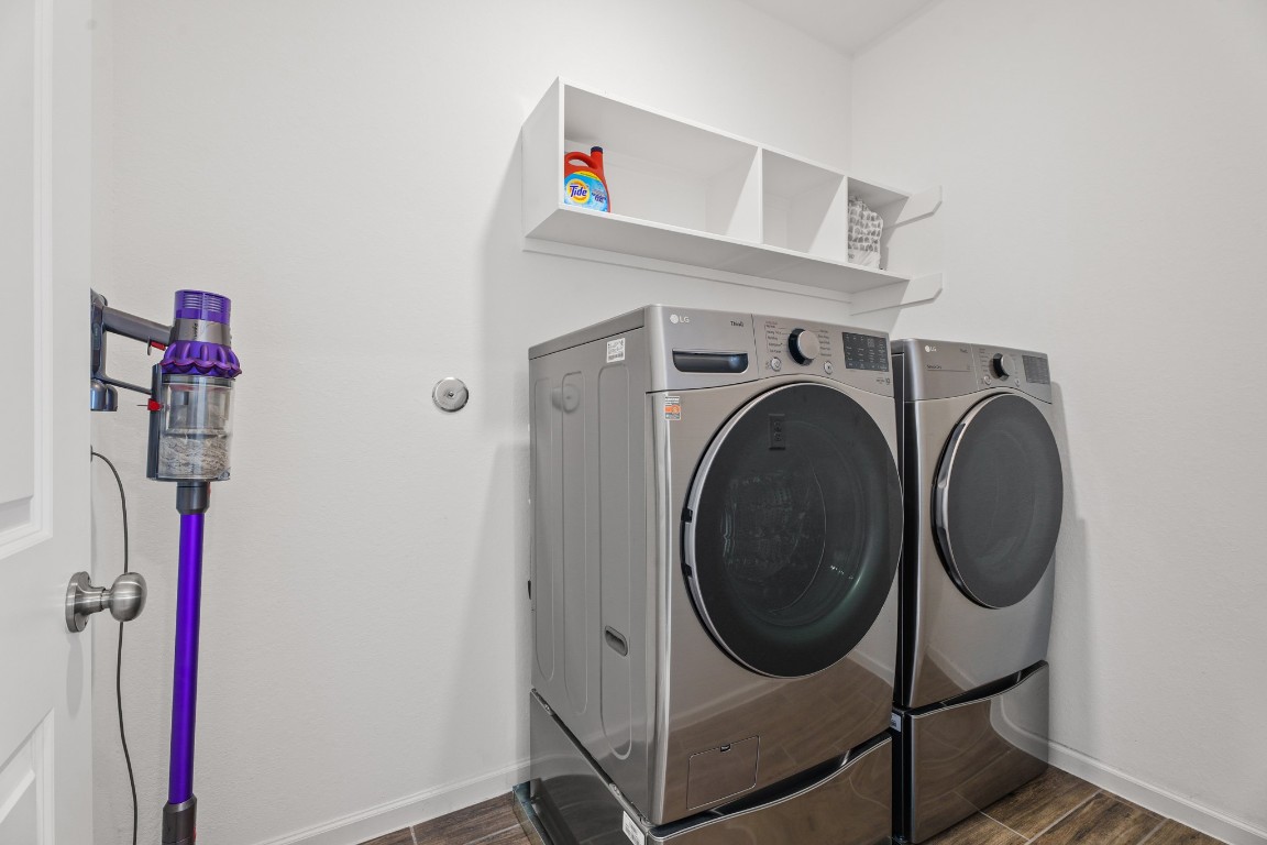 4103 Balboa Drive Iowa Colony, TX 77583 - Photo 23 of 30 a utility room with dryer and washer