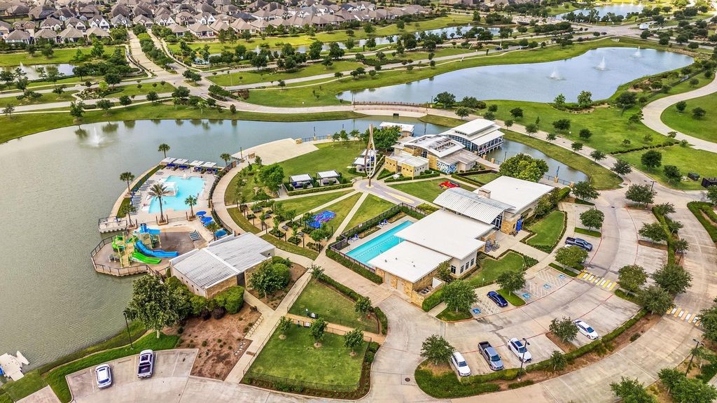 4103 Balboa Drive Iowa Colony, TX 77583 - Photo 28 of 30 an aerial view of a swimming pool with outdoor seating and yard