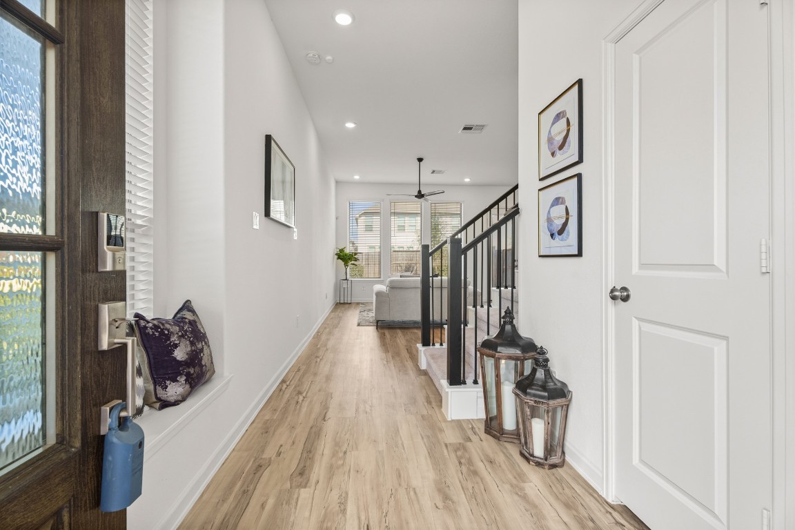 4103 Balboa Drive Iowa Colony, TX 77583 - Photo 4 of 30 a view of entryway and hall with wooden floor