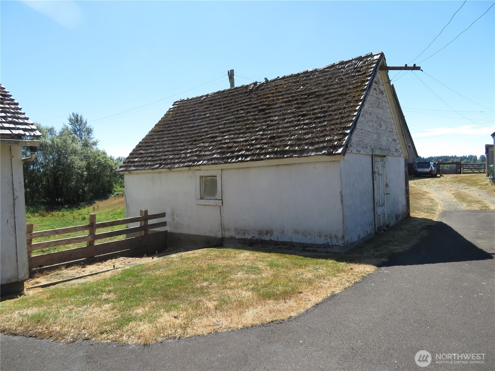 21 Wynoochee Valley Road Montesano, WA 98563 - Photo 13 of 38 a view of a backyard with wooden fence