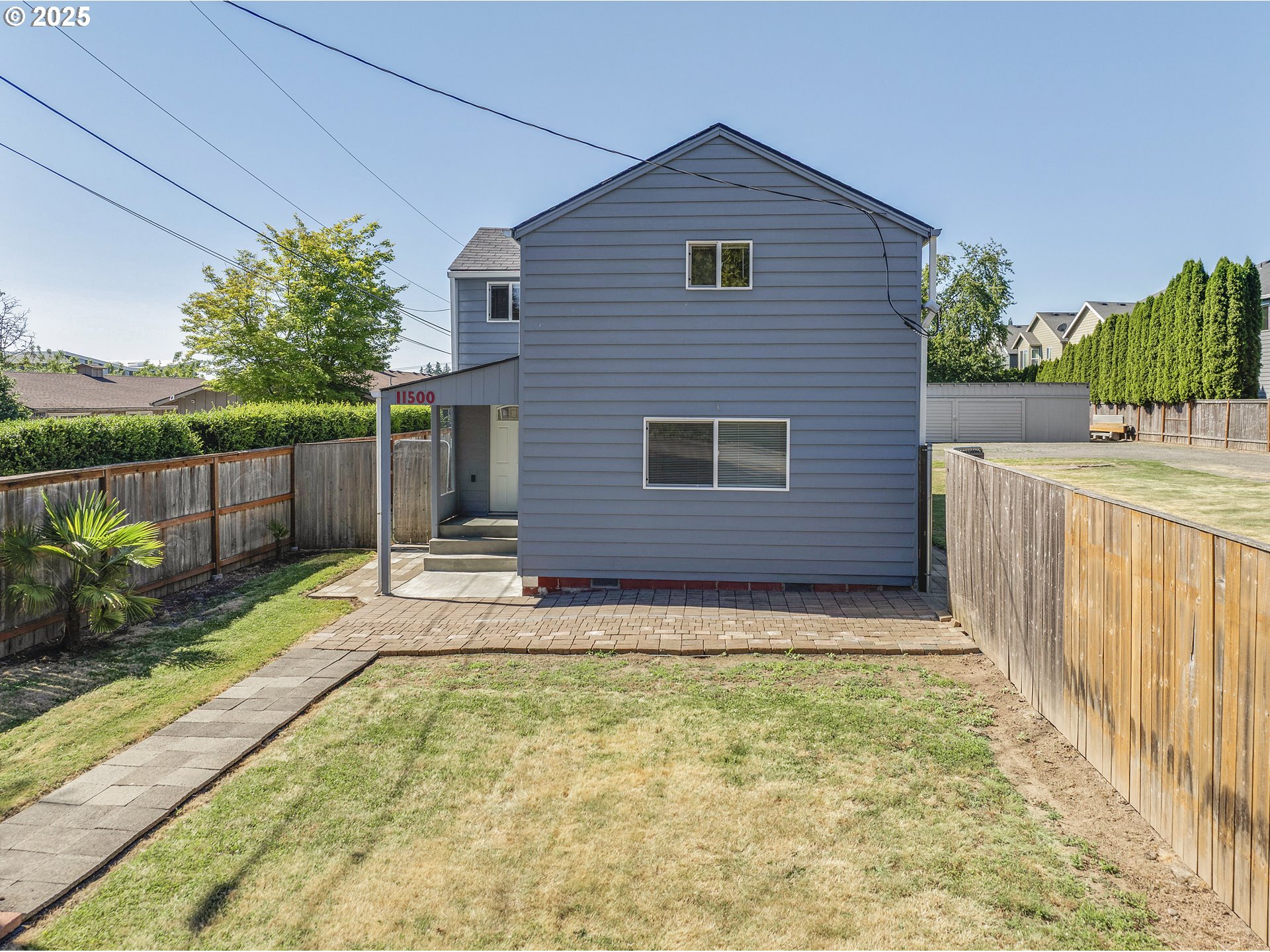 11500 Southwest Denney Road Beaverton, OR 97008 - Photo 3 of 45 a view of house with backyard and garden
