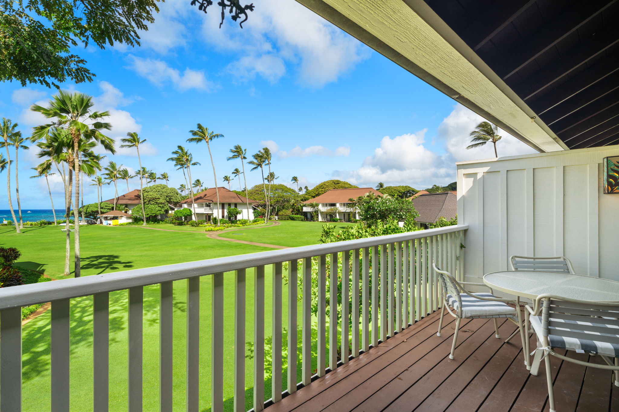 2253 Poipu Road, Unit 25 Koloa, HI 96756 - Photo 17 of 29 a view of a balcony with wooden floor