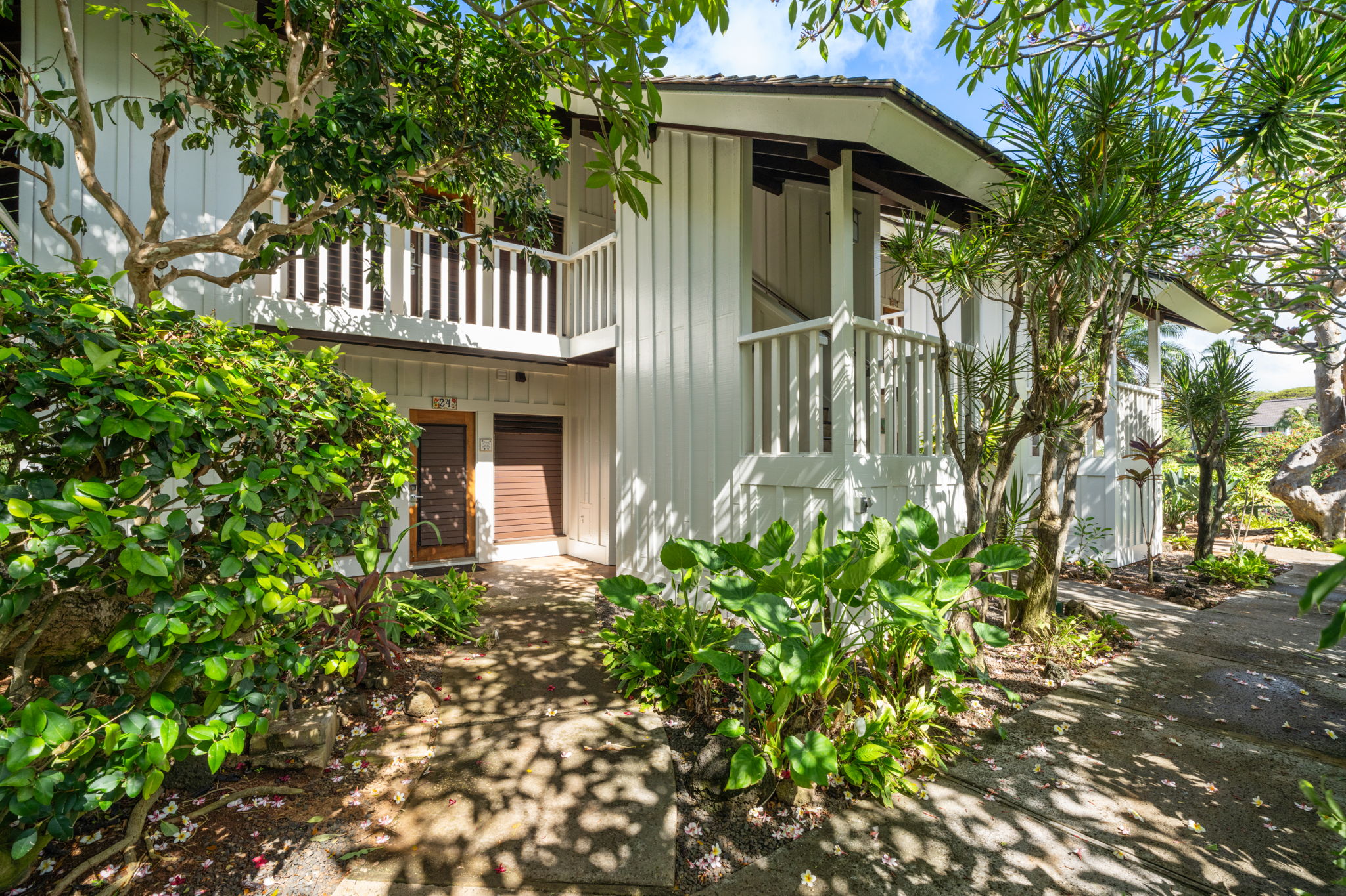2253 Poipu Road, Unit 25 Koloa, HI 96756 - Photo 20 of 29 a view of a house with a flower garden