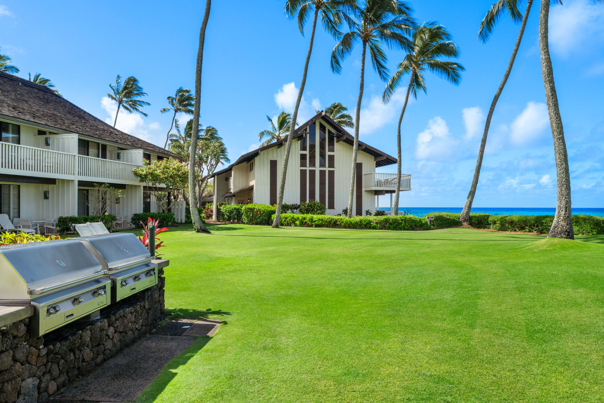 2253 Poipu Road, Unit 25 Koloa, HI 96756 - Photo 23 of 29 a front view of a house with garden