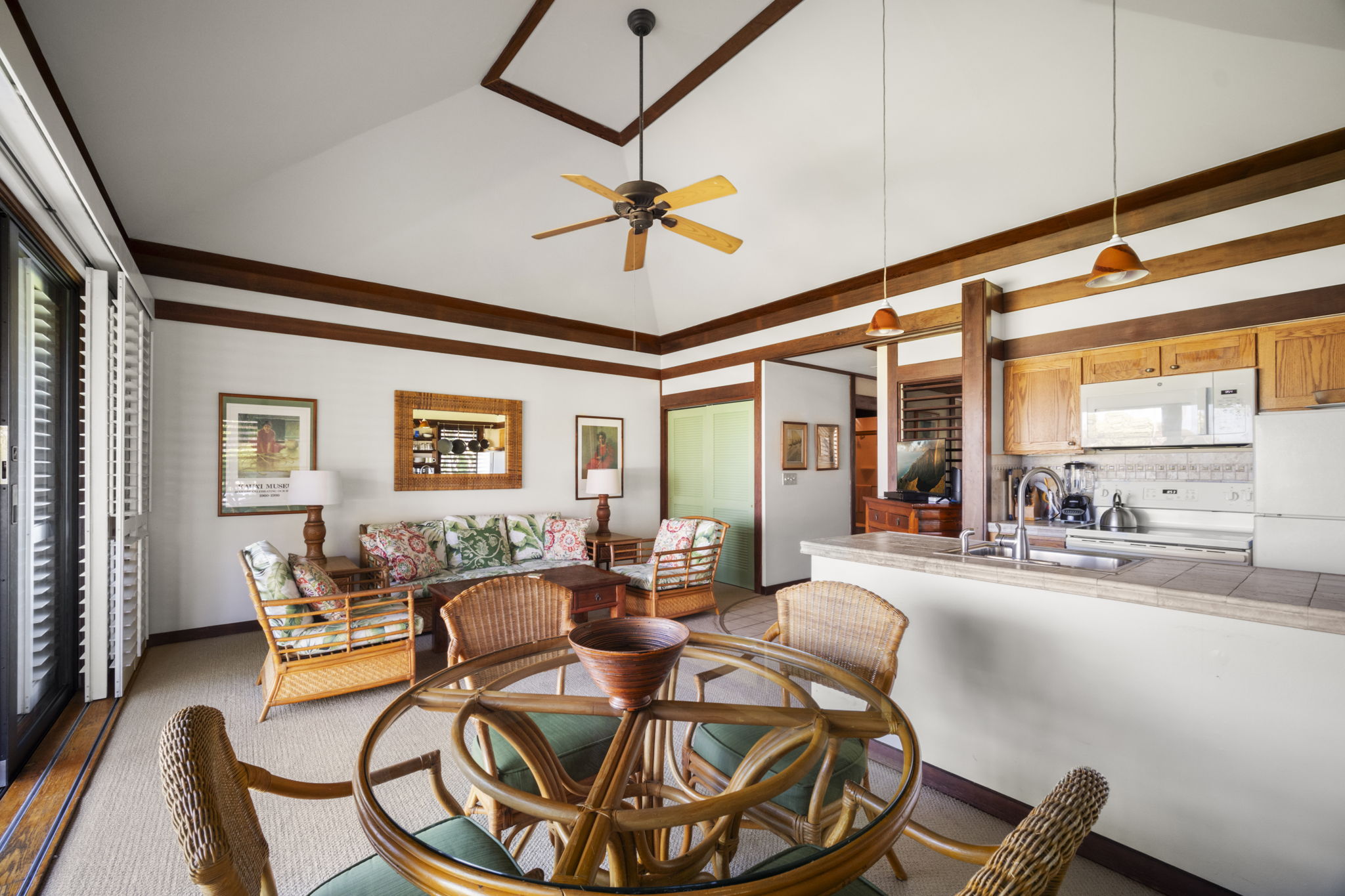 2253 Poipu Road, Unit 25 Koloa, HI 96756 - Photo 6 of 29 a living room with furniture and a large window