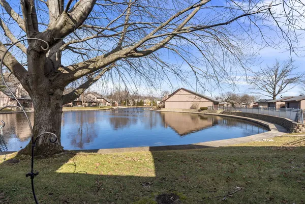 a view of swimming pool with a yard
