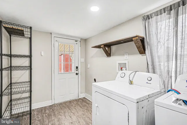 a utility room with dryer and washer