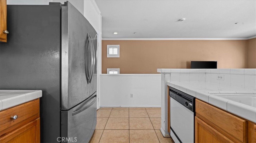 11450 Church Street, Unit 4 Rancho Cucamonga, CA 91730 - Photo 14 of 38 a view of a kitchen with a sink