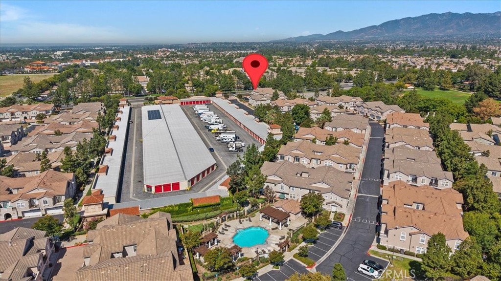 11450 Church Street, Unit 4 Rancho Cucamonga, CA 91730 - Photo 36 of 38 an aerial view of residential houses with outdoor space