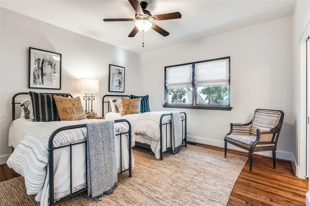 a bedroom with furniture and a window