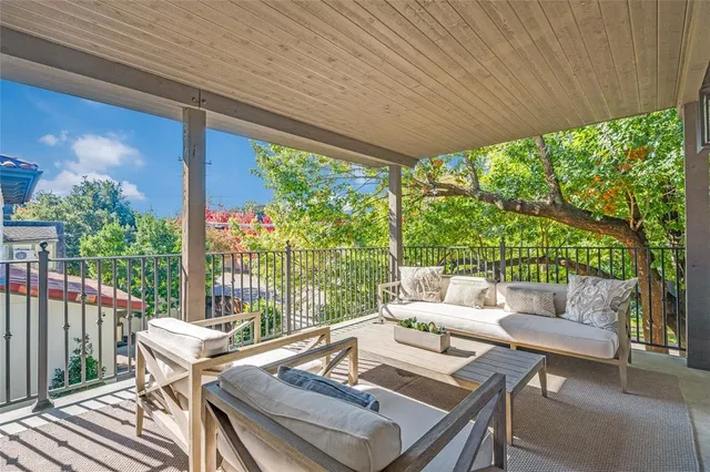 a view of a patio with a big yard