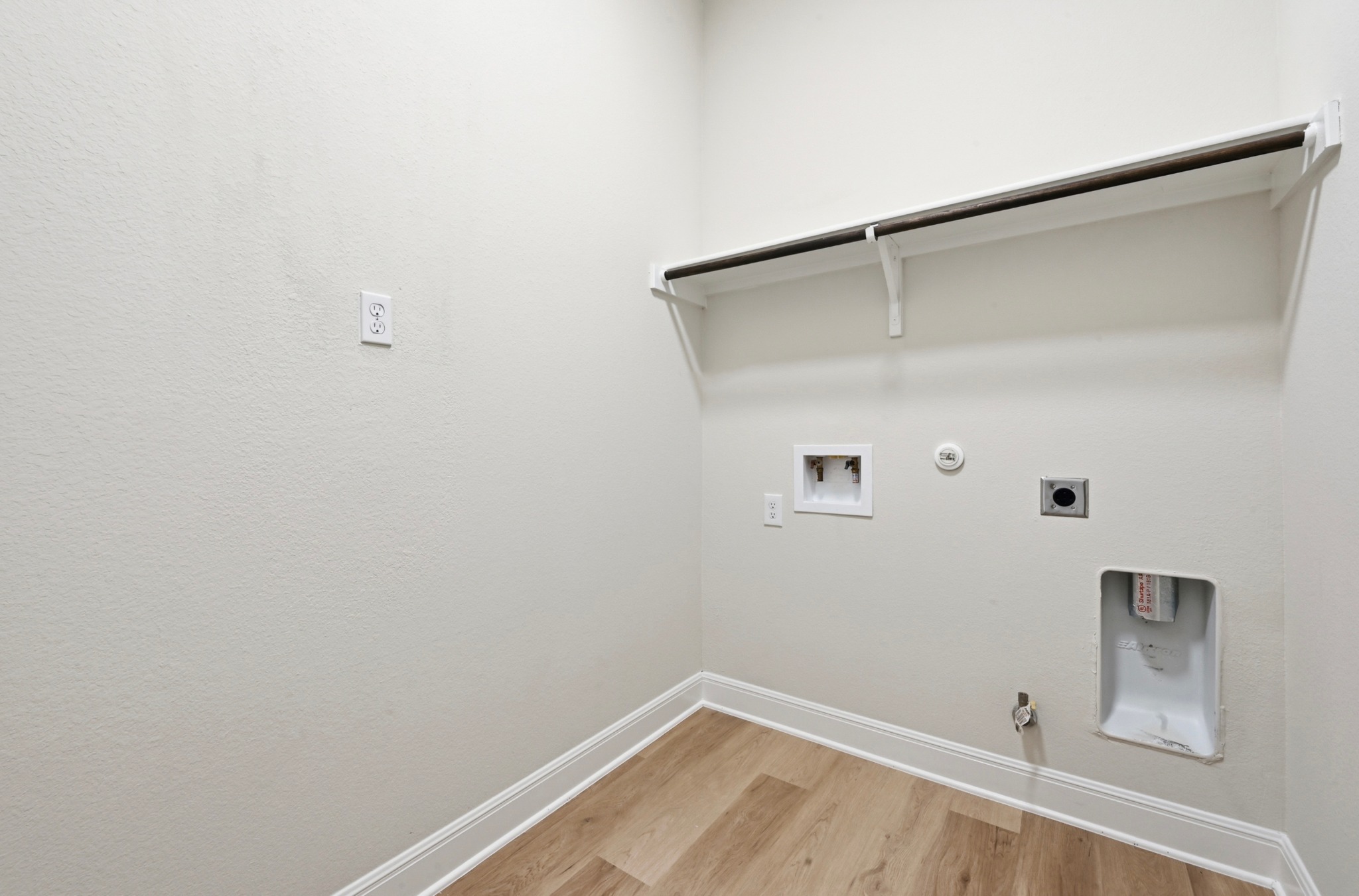 13009 Olivers Way Manchaca, TX 78652 - Photo 26 of 37 a view of small space with racks on the wall