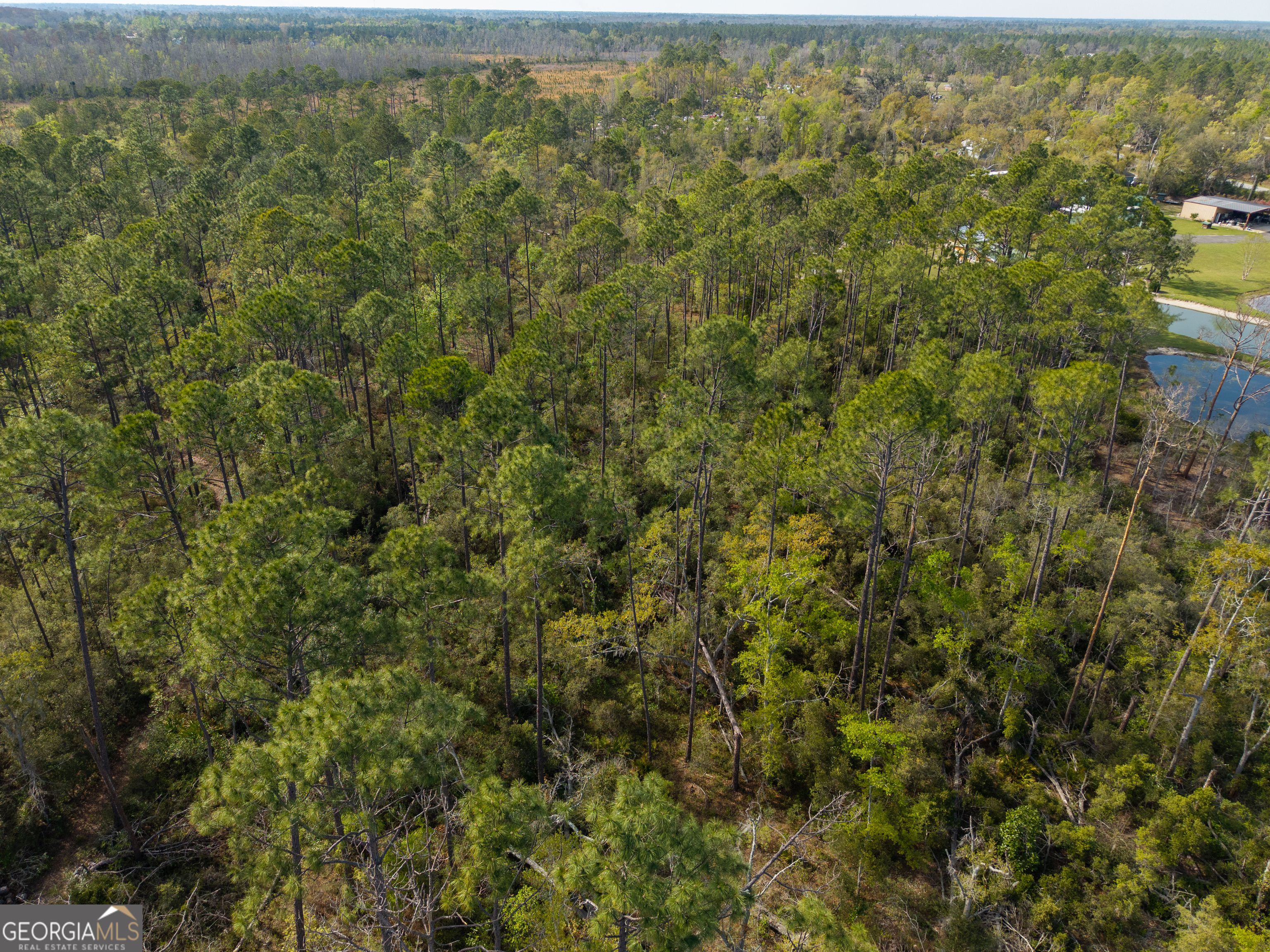 5536 Hickory Grove Road North Valdosta, GA 31606 - Photo 1 of 10 an aerial view of residential houses with outdoor space