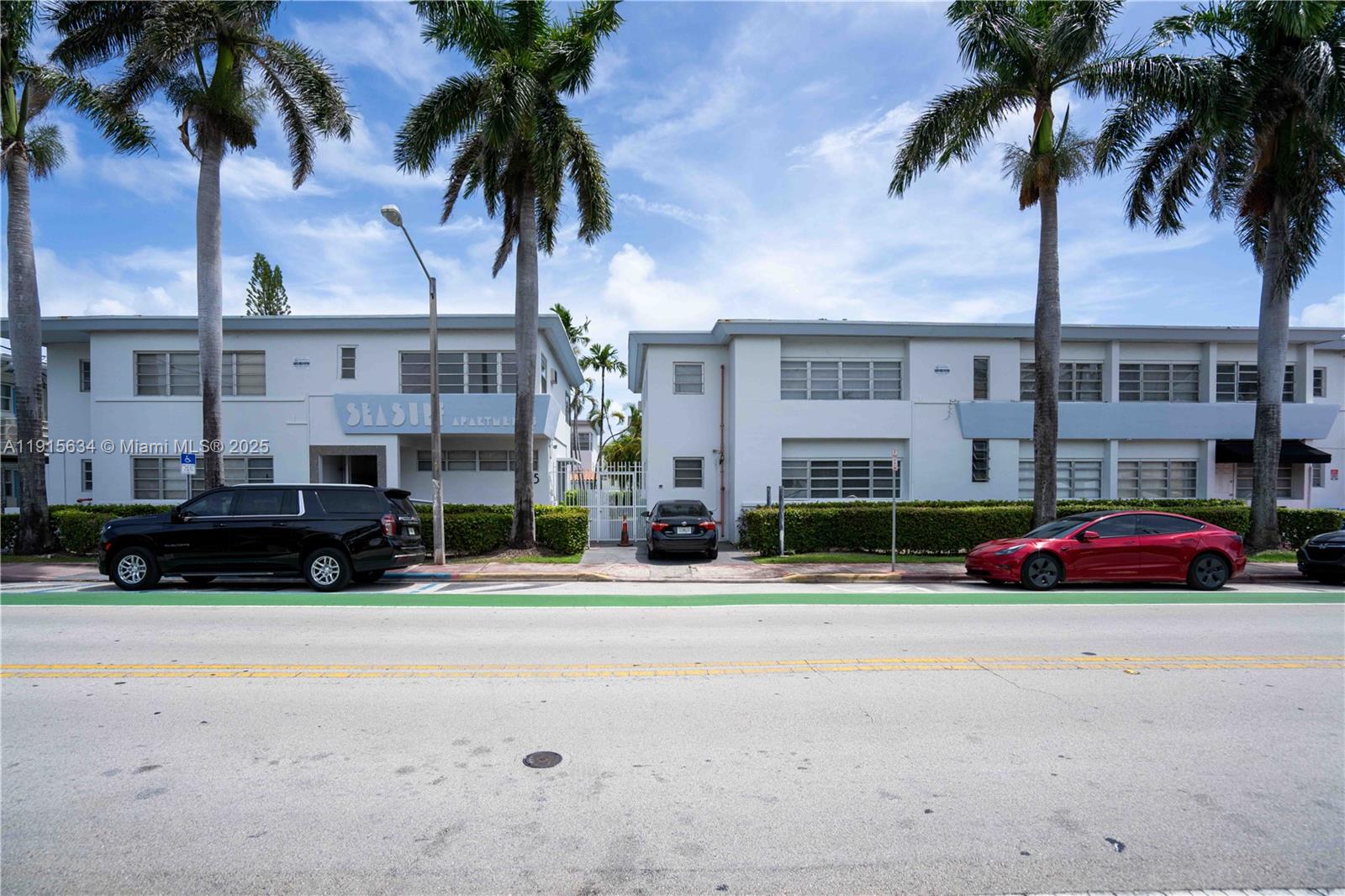 8315 Byron Avenue, Unit 2A Miami Beach, FL 33141 - Photo 12 of 13 a front view of building with cars parked