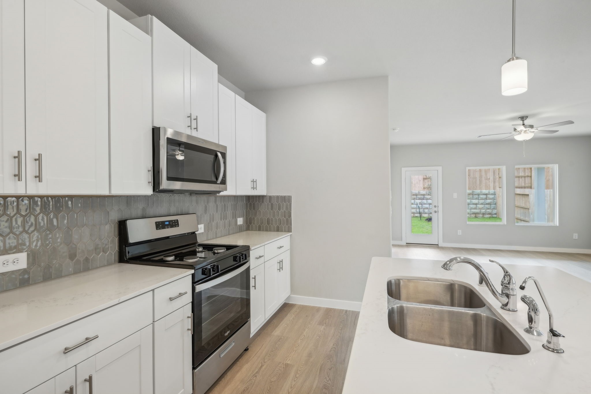 14309 Grey Pointe Court Conroe, TX 77302 - Photo 2 of 22 Photo is not of the actual home, but is an inspirational photo of builder’s model home and may depict options, furnishings, and/or decorator features that are not included