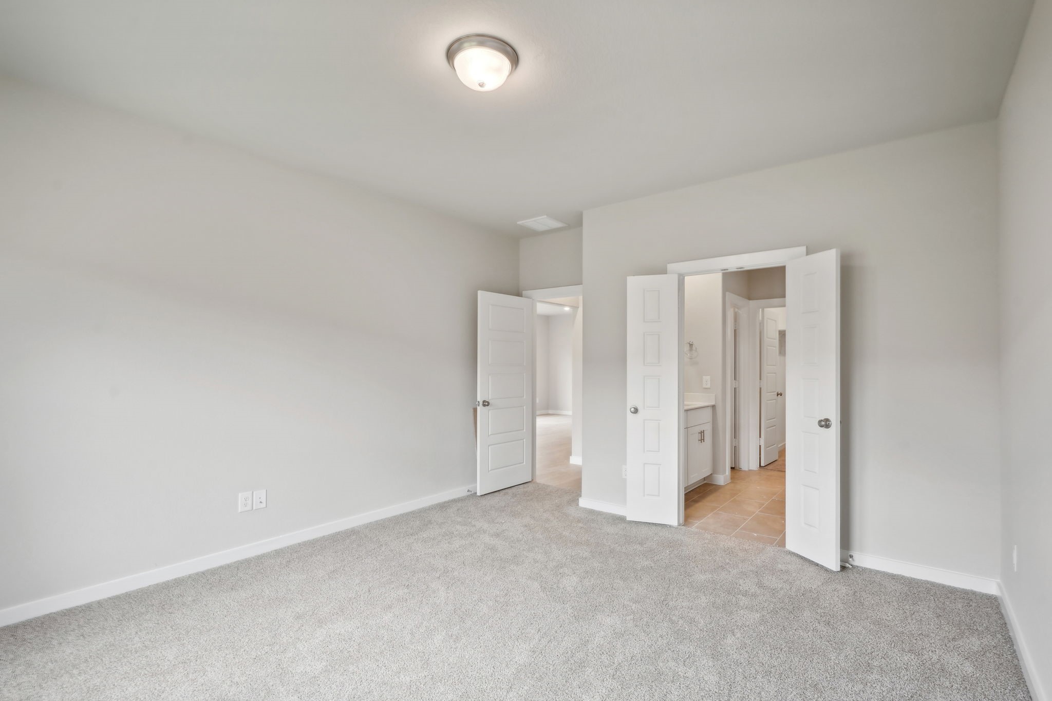 14309 Grey Pointe Court Conroe, TX 77302 - Photo 7 of 22 Photo is not of the actual home, but is an inspirational photo of builder’s model home and may depict options, furnishings, and/or decorator features that are not included