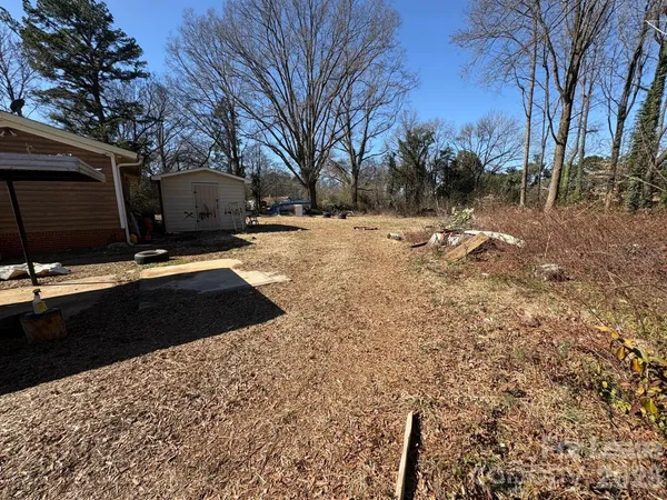 a view of backyard with outdoor space