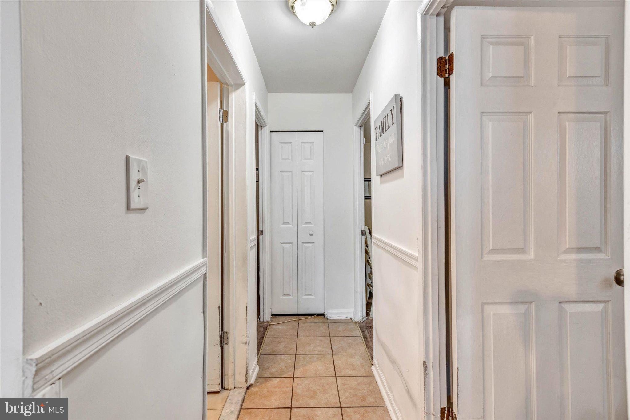 7167 Fairbrook Road Windsor Mill, MD 21244 - Photo 17 of 34 Bright and inviting hallway space.