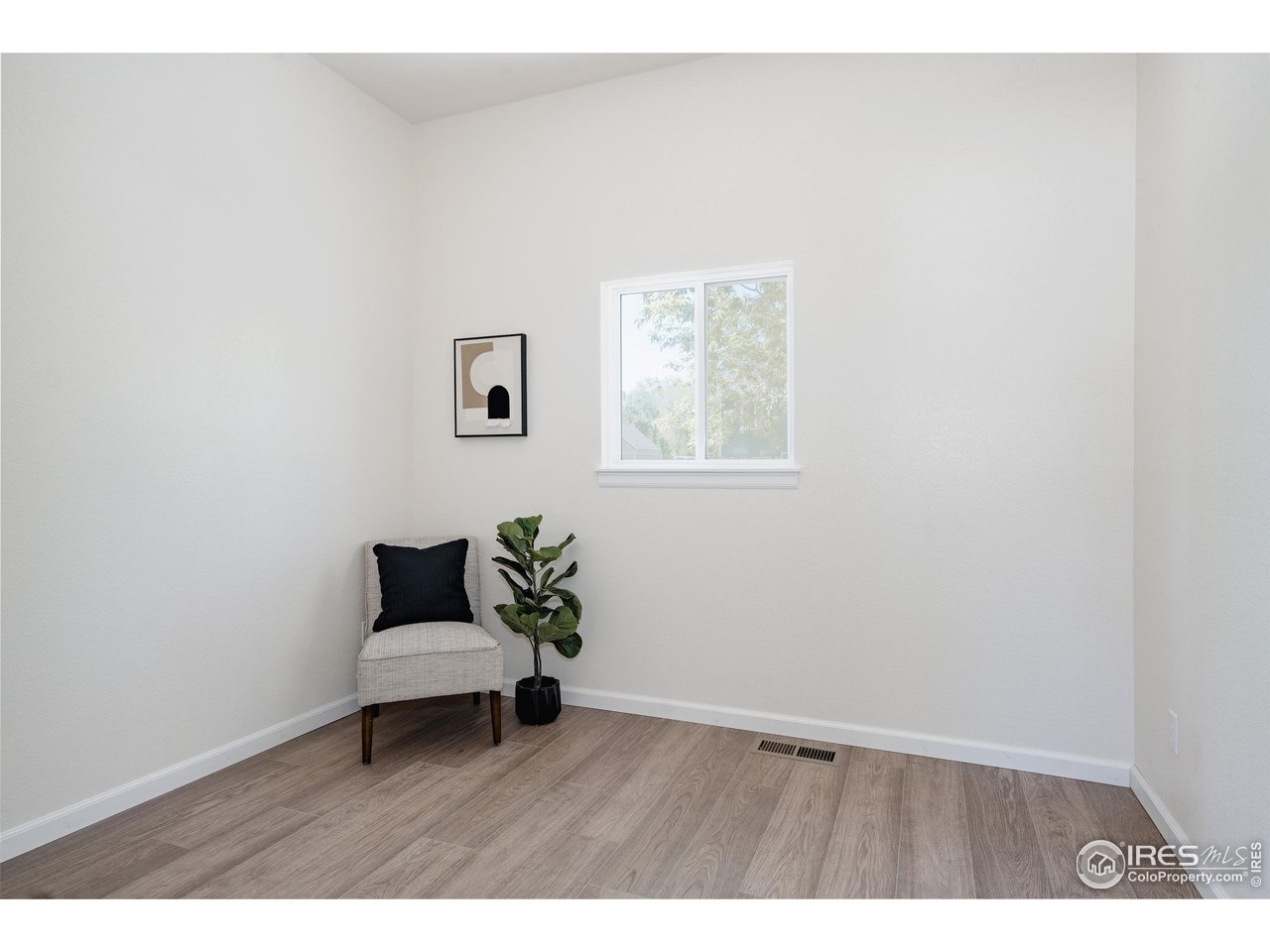 934 6th Street Berthoud, CO 80513 - Photo 14 of 28 a white bench sitting in a bathroom next to a window