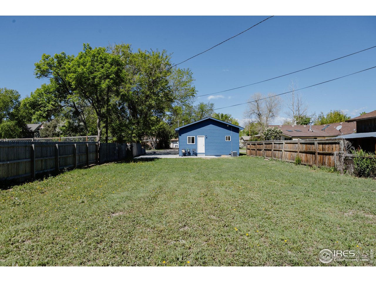 934 6th Street Berthoud, CO 80513 - Photo 22 of 28 a house view with a garden space