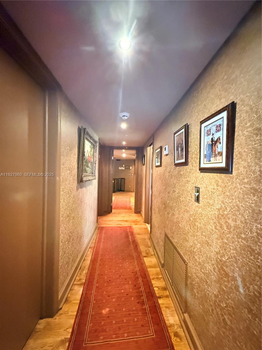 5877 Southwest 123rd Avenue, Unit MAIN Miami, FL 33183 - Photo 13 of 34 a view of a hallway
