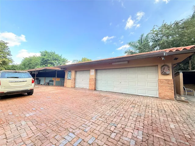 a car parked in front of house