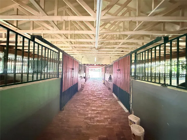 a view of a living room and a wooden floor