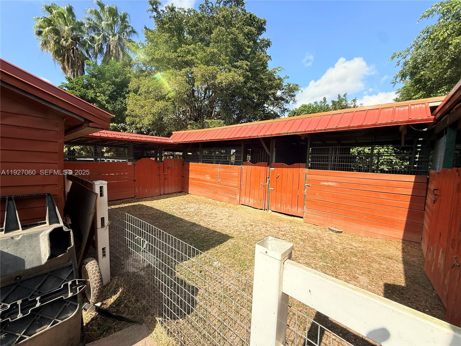 5877 Southwest 123rd Avenue, Unit MAIN Miami, FL 33183 - Photo 19 of 34 a view of a balcony with an outdoor space