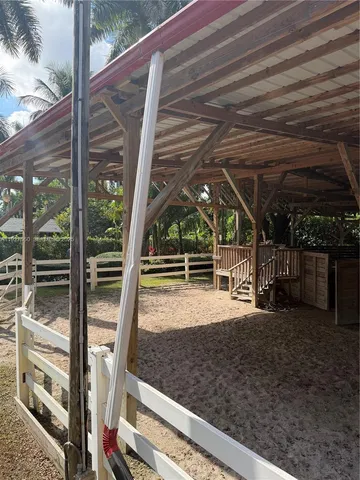 a view of an empty room with balcony
