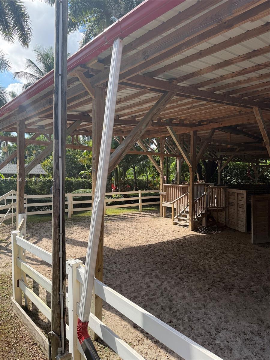 5877 Southwest 123rd Avenue, Unit MAIN Miami, FL 33183 - Photo 4 of 34 a view of an empty room with balcony