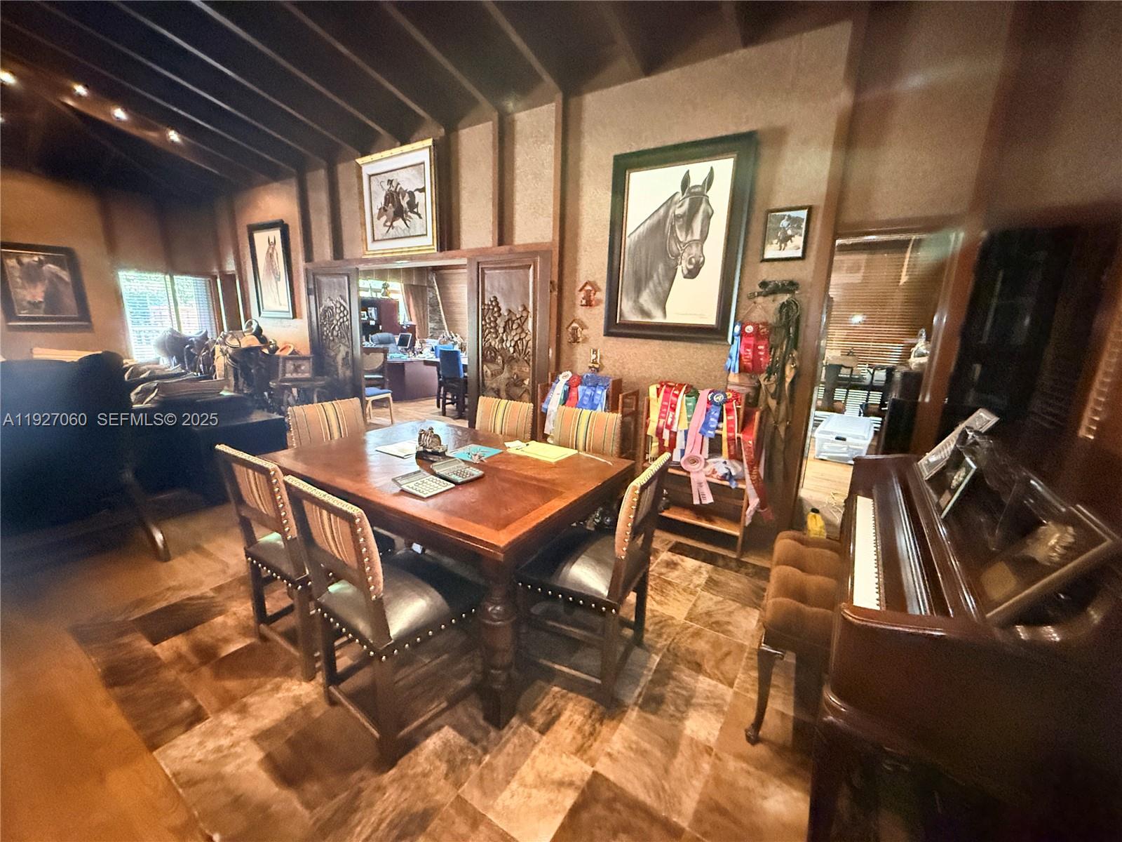 5877 Southwest 123rd Avenue, Unit MAIN Miami, FL 33183 - Photo 9 of 34 a outdoor dining space with furniture and window