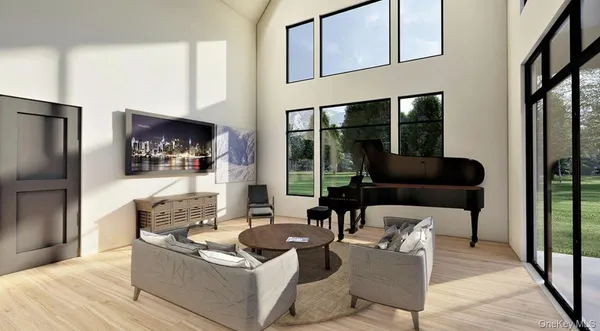 a living room with fireplace furniture and a floor to ceiling window