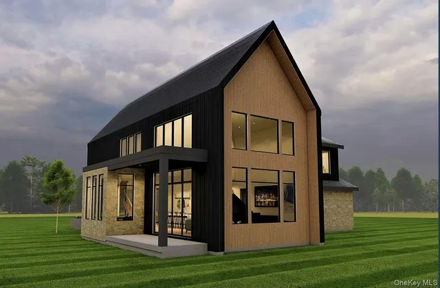 a view of a house with backyard and porch