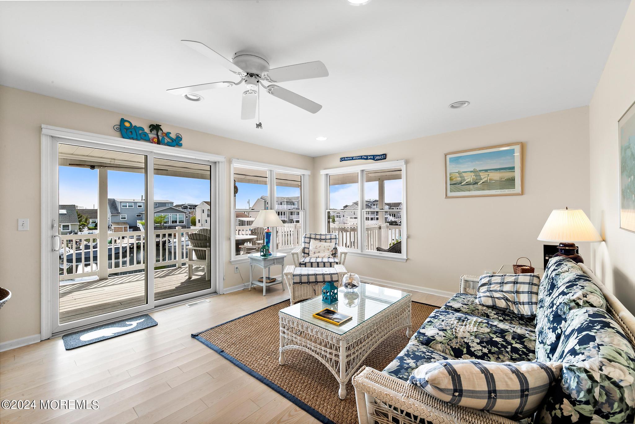 10 Arnold Boulevard Beach Haven, NJ 08008 - Photo 28 of 81 a living room with furniture and a large window