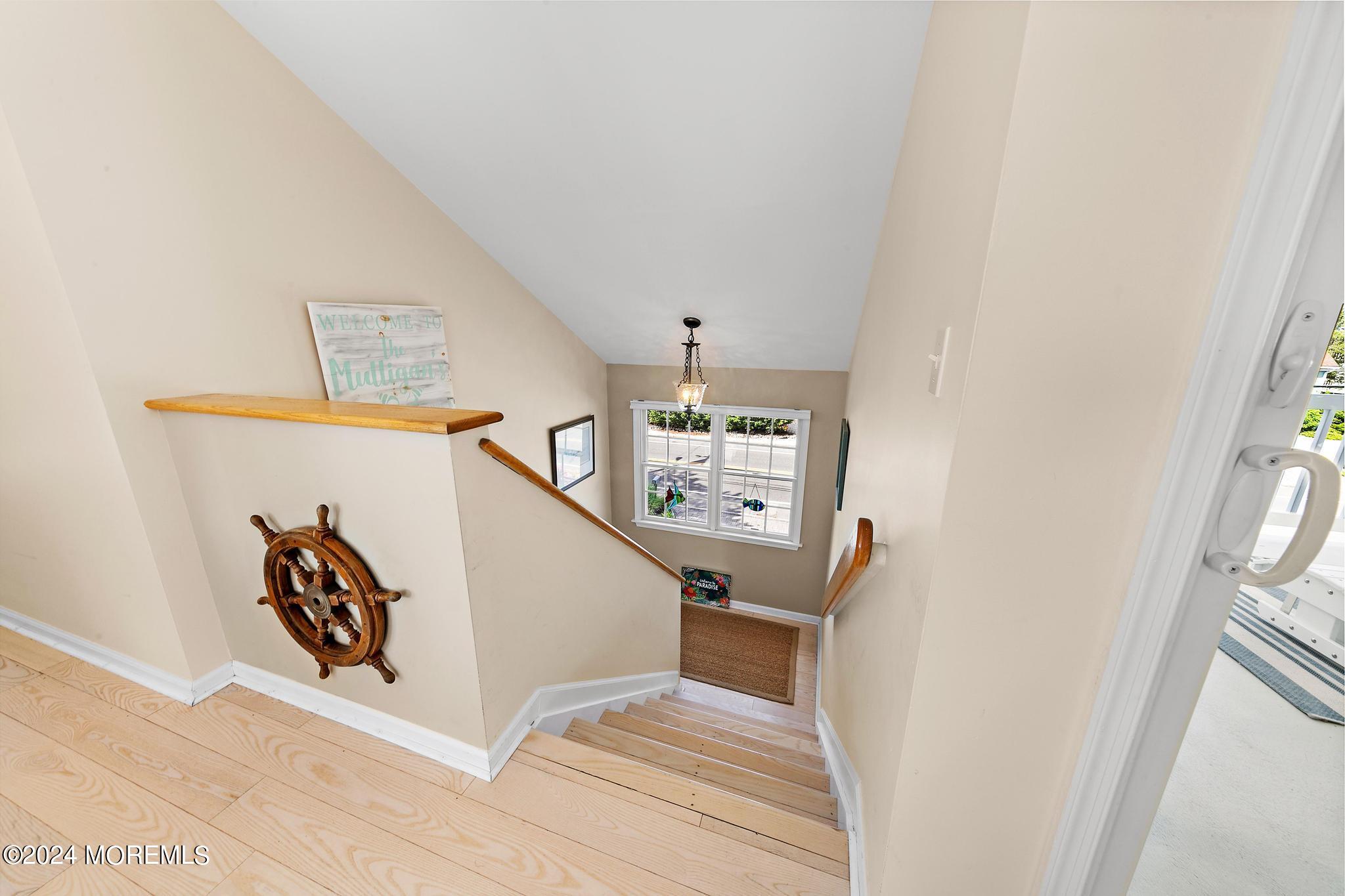 10 Arnold Boulevard Beach Haven, NJ 08008 - Photo 36 of 81 a view of a hallway with windows and stairs