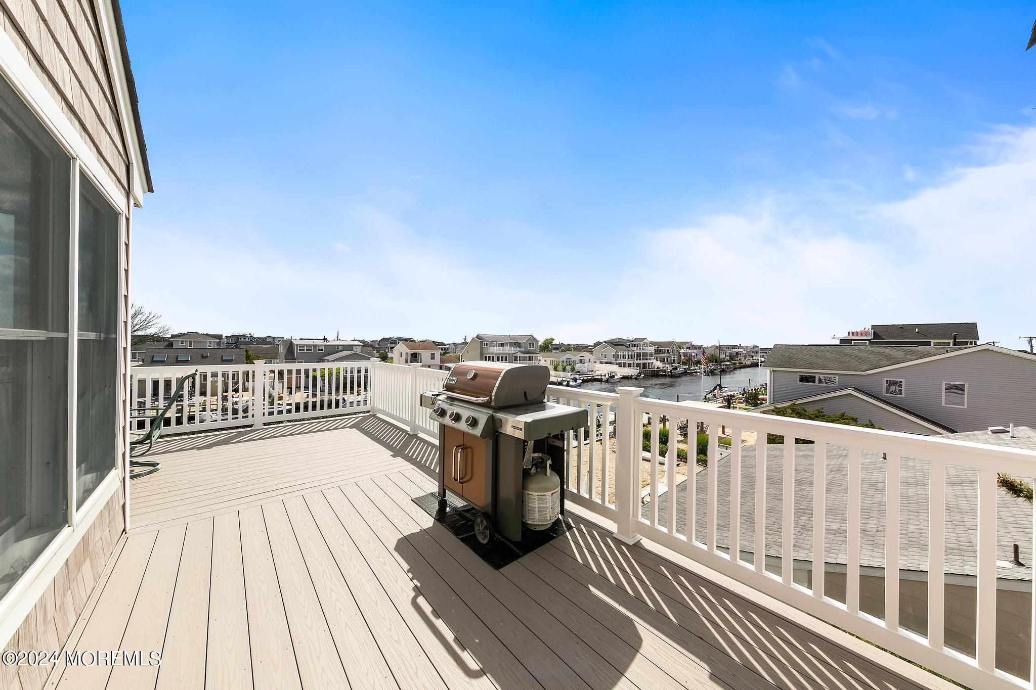 10 Arnold Boulevard Beach Haven, NJ 08008 - Photo 50 of 81 a view of a roof with wooden floor and city view
