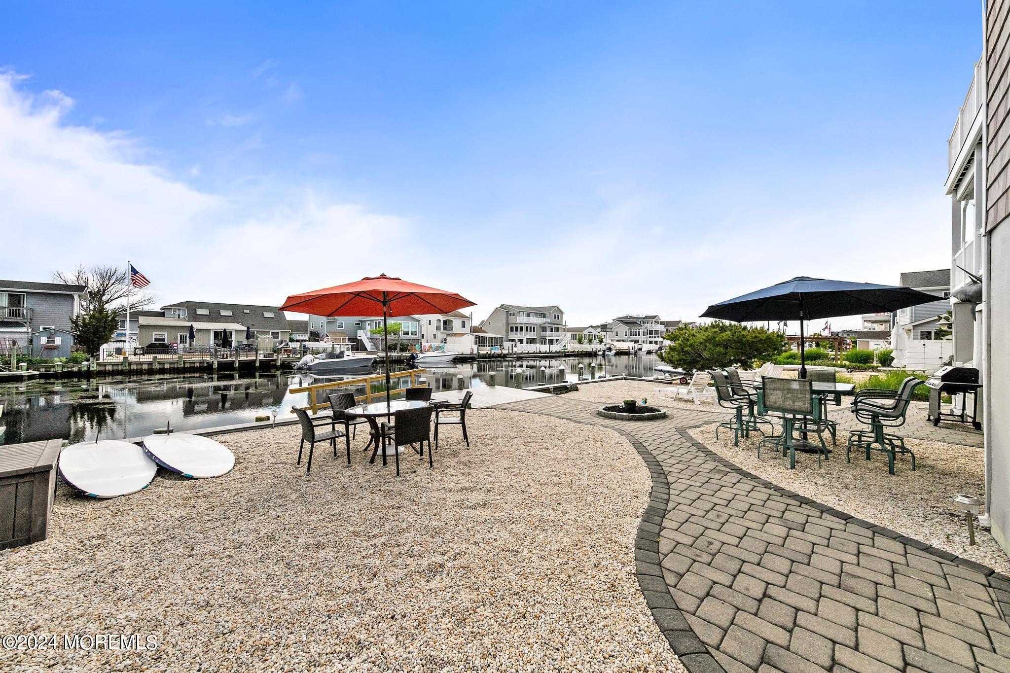 10 Arnold Boulevard Beach Haven, NJ 08008 - Photo 51 of 81 a view of a swimming pool and outdoor seating