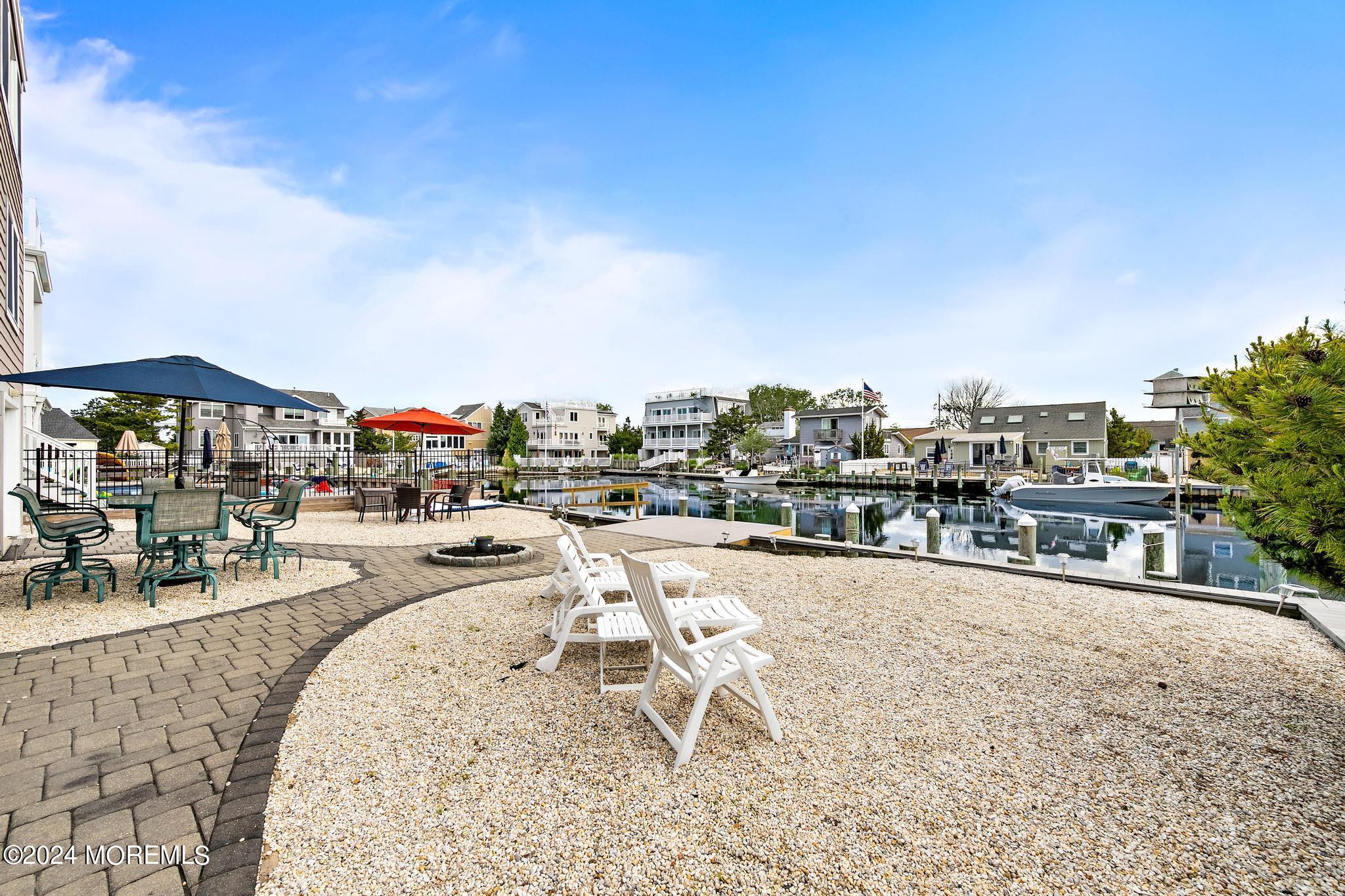 10 Arnold Boulevard Beach Haven, NJ 08008 - Photo 57 of 81 a view of a swimming pool with outdoor seating