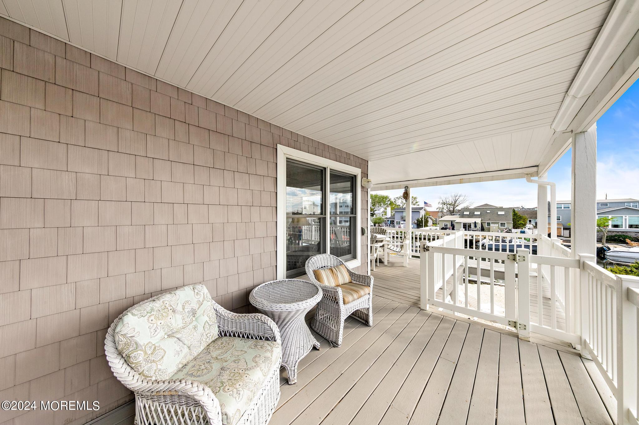 10 Arnold Boulevard Beach Haven, NJ 08008 - Photo 59 of 81 a living room with furniture and a table