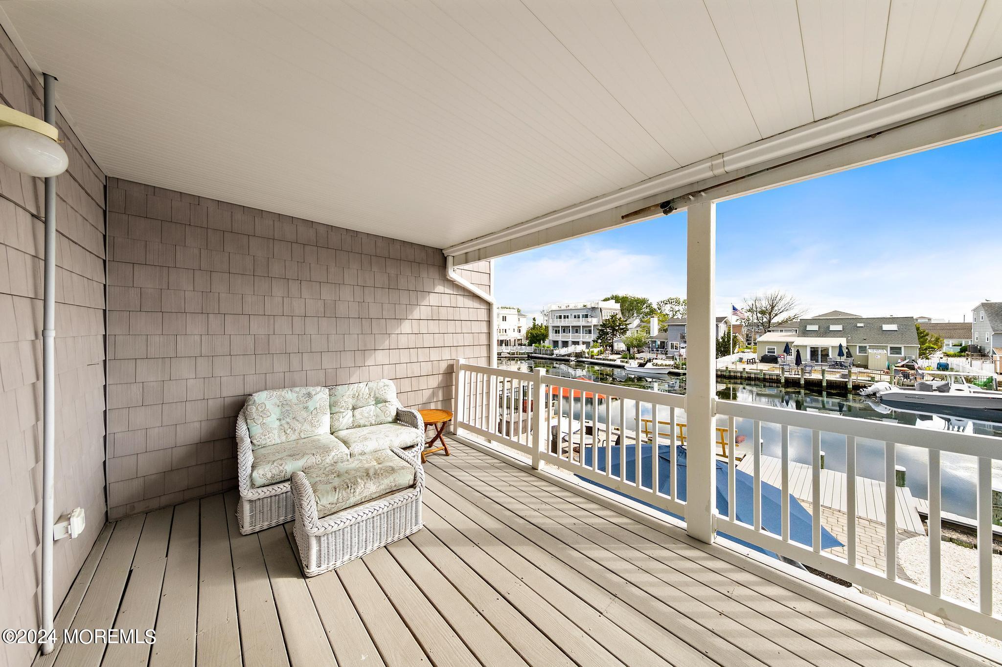 10 Arnold Boulevard Beach Haven, NJ 08008 - Photo 60 of 81 a balcony with wooden floor